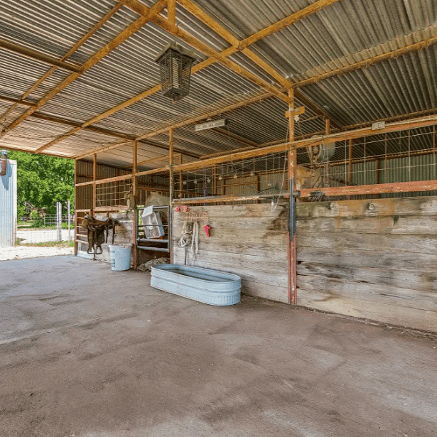 wooden and metal horse barn with three stalls, water trough for sale in wichita falls tx