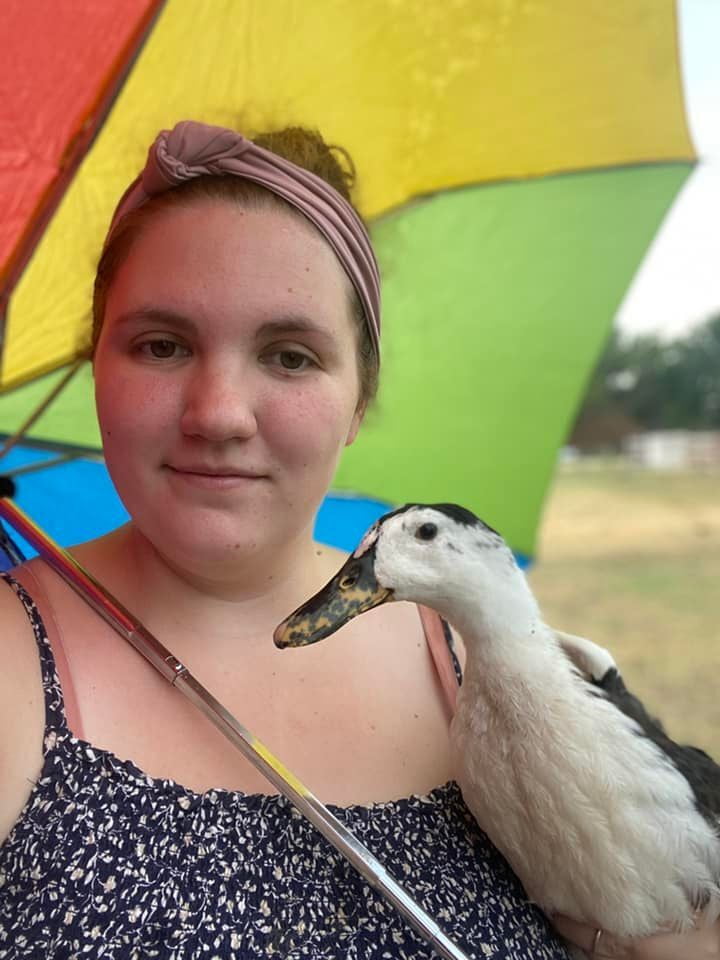 Maverick and Kalina Under an Umbrella (Summer 2022)